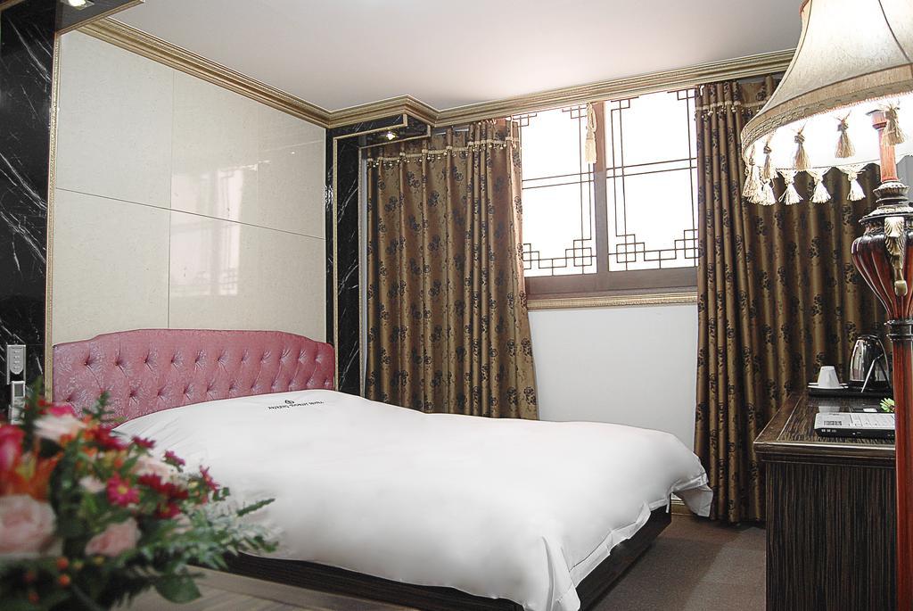 Arirang Tourist Hotel Чханвон Номер фото
